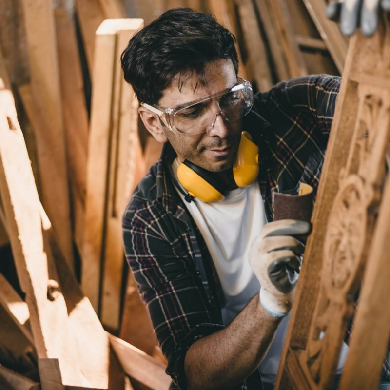 portrait-professional-carpenter-man-hand-working-make-wooden-handcraft-furniture-master-workpiece.jpg